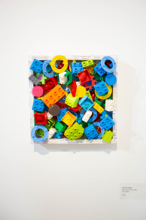 jeff schofield recycled toys in paper frame